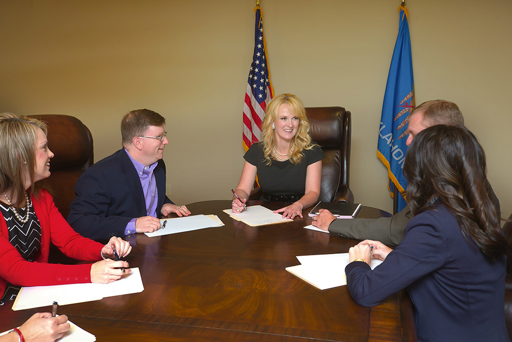 Toni Hasenbeck meeting with educators